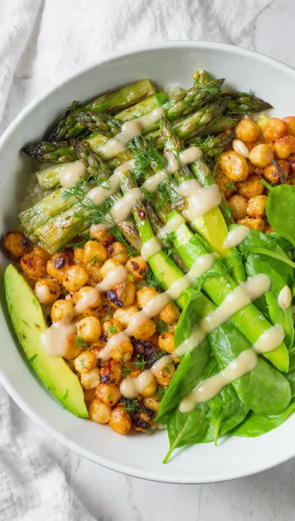 9. Spring Veggie Grain Bowl with Lemon Tahini Dressing (Hippie Delicious)